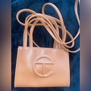Small tan telfar bag worn once